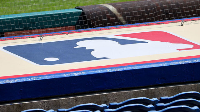 PHILADELPHIA, PA - APRIL 04: A general of the Major League Baseball logo atop the visiting dugout prior to the Major League Baseball game between the Philadelphia Phillies and the Atlanta Braves on April 4, 2021 at Citizens Bank Park in Philadelphia, PA.