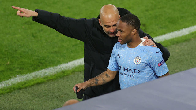 DORTMUND, GERMANY - APRIL 14: Pep Guardiola, Manager of Manchester City speaks with Substitute, Raheem Sterling of Manchester City during the UEFA Champions League Quarter Final Second Leg match between Borussia Dortmund and Manchester City at Signal Iduna Park on April 14, 2021 in Dortmund, Germany. Sporting stadiums around Germany remain under strict restrictions due to the Coronavirus Pandemic as Government social distancing laws prohibit fans inside venues resulting in games being played behind closed doors.