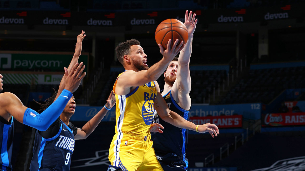 OKLAHOMA CITY, OK - APRIL 14: Stephen Curry #30 of the Golden State Warriors drives to the basket against the Oklahoma City Thunder on April 14, 2021 at Chesapeake Energy Arena in Oklahoma City, Oklahoma. Mandatory Copyright Notice: Copyright 2021 NBAE