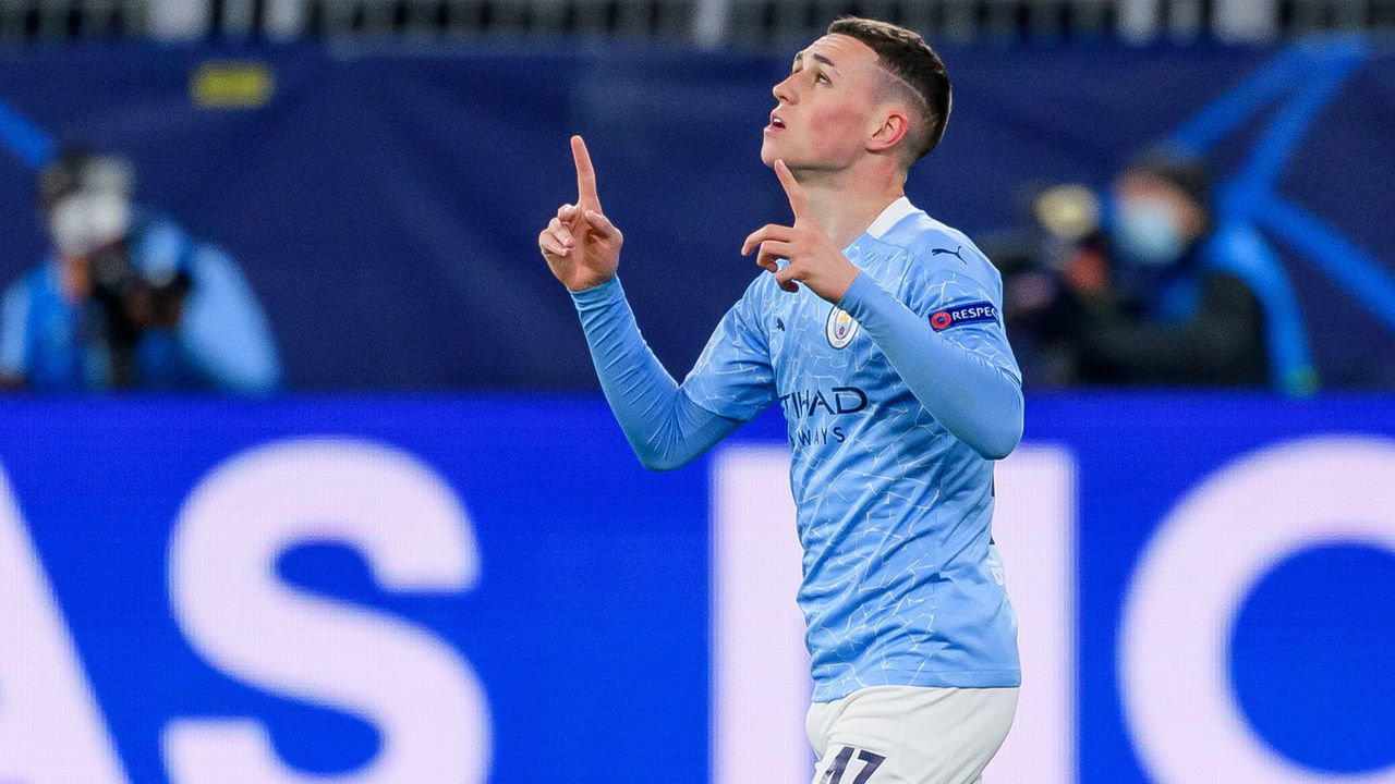 DORTMUND, GERMANY - APRIL 14:(BILD ZEITUNG OUT) Phil Foden of Manchester City celebrates after scoring his team's second goal during the UEFA Champions League Quarter Final Second Leg match between Borussia Dortmund and Manchester City at Signal Iduna Park on April 14, 2021 in Dortmund, Germany.