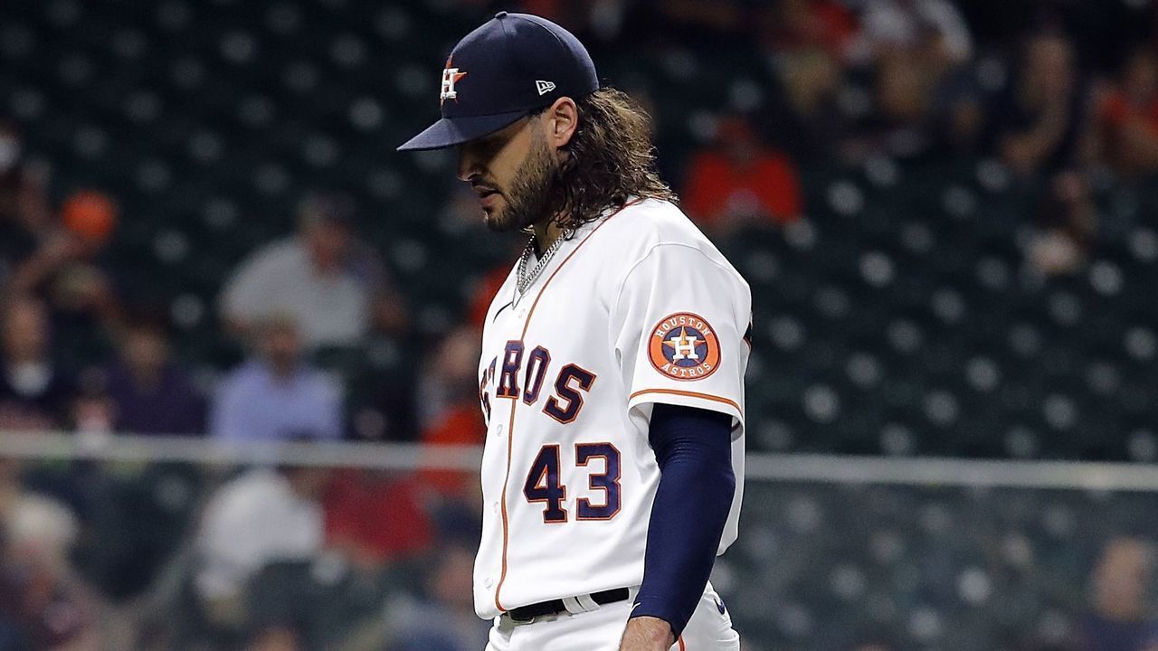 HOUSTON, TEXAS - APRIL 14: Lance McCullers Jr. #43 of the Houston Astros walks to the bench in the second inning against the Detroit Tigers at Minute Maid Park on April 14, 2021 in Houston, Texas.