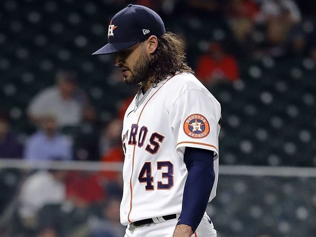 HOUSTON, TEXAS - APRIL 14: Lance McCullers Jr. #43 of the Houston Astros walks to the bench in the second inning against the Detroit Tigers at Minute Maid Park on April 14, 2021 in Houston, Texas.