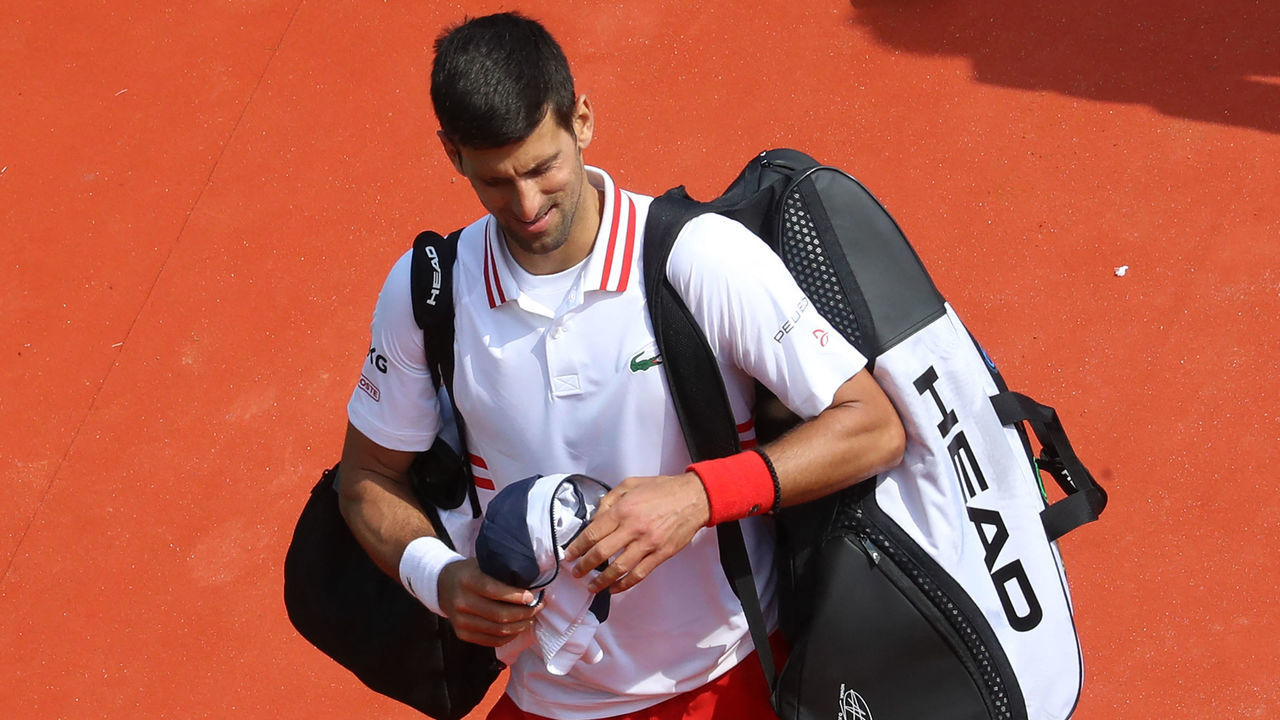 Serbia's Novak Djokovic leaves the court after his defeat in his third round singles match against Britain's Daniel Evans on day six of the Monte-Carlo ATP Masters Series tournament in Monaco on April 15, 2021.