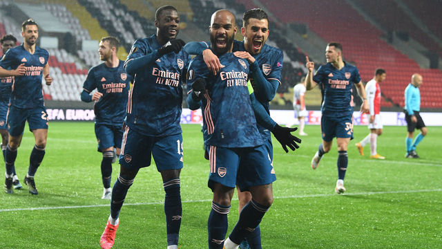 PRAGUE, CZECH REPUBLIC - APRIL 15: (2ndL) Alex Lacazette celebrates scoring the 2nd Arsenal goal with (L) Nicolas Pepe and (R) Dani Ceballos during the UEFA Europa League Quarter Final Second Leg match between Slavia Praha and Arsenal FC at Sinobo Stadium on April 15, 2021 in Prague, Czech Republic. Sporting stadiums around Europe remain under strict restrictions due to the Coronavirus Pandemic as Government social distancing laws prohibit fans inside venues resulting in games being played behind closed doors.