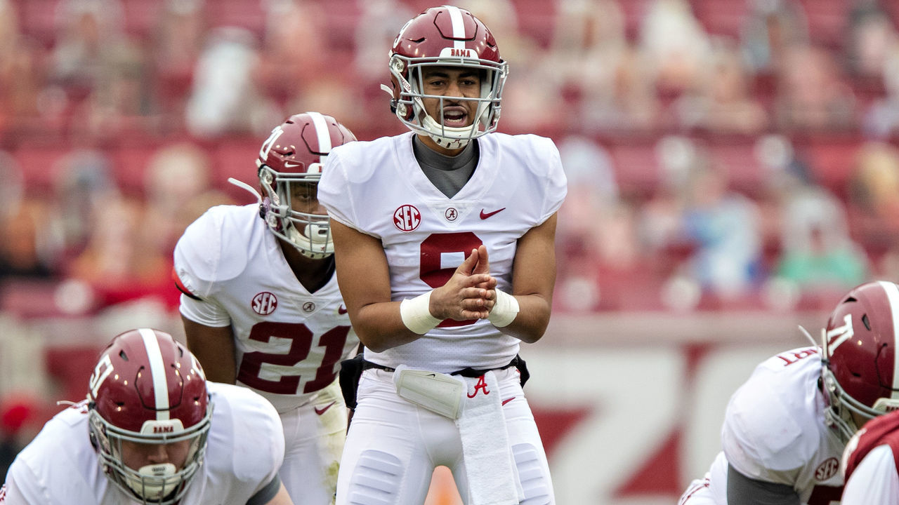 FAYETTEVILLE, AR - DECEMBER 12: Bryce Young #9 of the Alabama Crimson Tide waits for the snap during a game against the Arkansas Razorbacks at Razorback Stadium on December 12, 2020 in Fayetteville, Arkansas. The Crimson Tide defeated the Razorbacks 52-3.