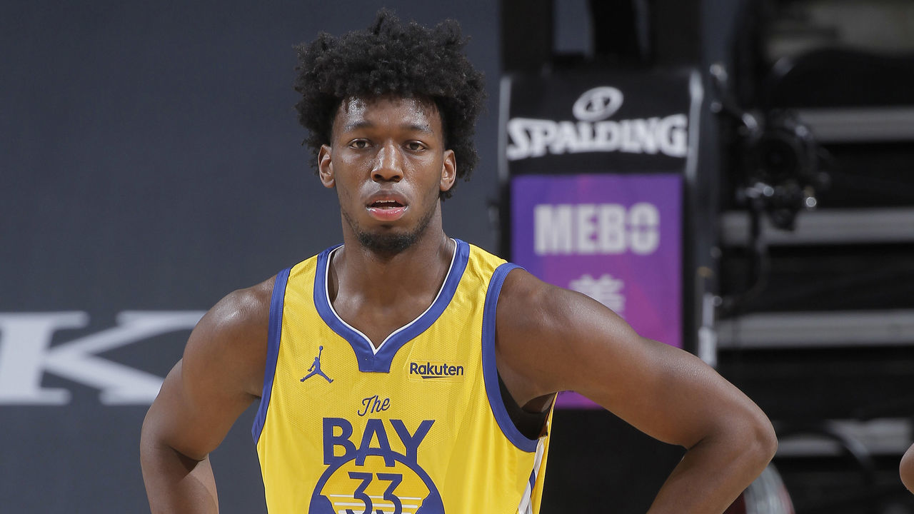 SACRAMENTO, CA - MARCH 25: James Wiseman #33 of the Golden State Warriors looks on during the game against the Sacramento Kings on March 25, 2021 at Golden 1 Center in Sacramento, California. NOTE TO USER: User expressly acknowledges and agrees that, by downloading and or using this photograph, User is consenting to the terms and conditions of the Getty Images Agreement. Mandatory Copyright Notice: Copyright 2021 NBAE