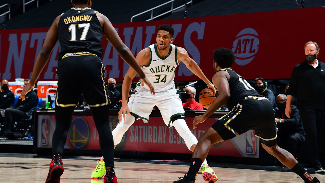 ATLANTA, GA - APRIL 15: Giannis Antetokounmpo #34 of the Milwaukee Bucks dribbles the ball during the game against the Atlanta Hawks on April 15, 2021 at State Farm Arena in Atlanta, Georgia. NOTE TO USER: User expressly acknowledges and agrees that, by downloading and/or using this Photograph, user is consenting to the terms and conditions of the Getty Images License Agreement. Mandatory Copyright Notice: Copyright 2021 NBAE