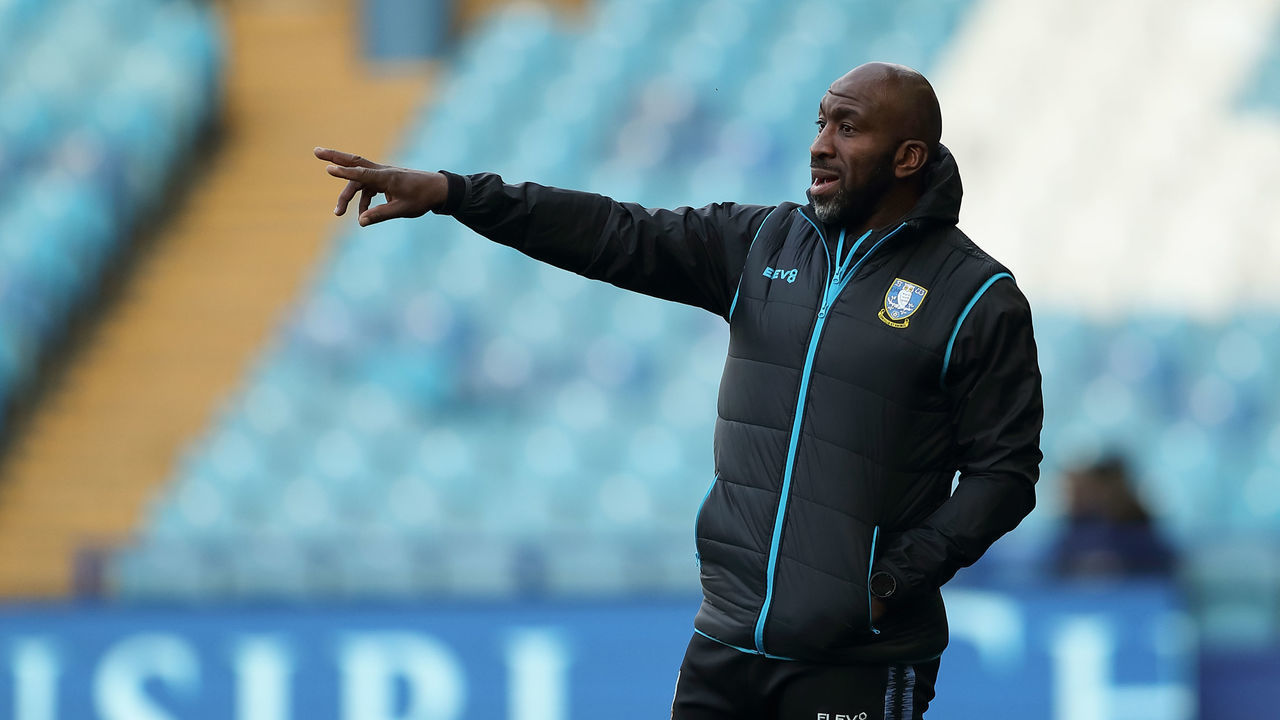 SHEFFIELD, ENGLAND - APRIL 13: Darren Moore the manager \ head coach of Sheffield Wednesday during the Sky Bet Championship match between Sheffield Wednesday and Swansea City at Hillsborough Stadium on April 13, 2021 in Sheffield, England. Sporting stadiums around the UK remain under strict restrictions due to the Coronavirus Pandemic as Government social distancing laws prohibit fans inside venues resulting in games being played behind closed doors.
