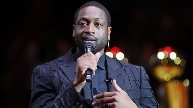 MIAMI, FLORIDA - FEBRUARY 22: Former Miami Heat player Dwyane Wade addresses the crowd during his jersey retirement ceremony at American Airlines Arena on February 22, 2020 in Miami, Florida. NOTE TO USER: User expressly acknowledges and agrees that, by downloading and/or using this photograph, user is consenting to the terms and conditions of the Getty Images License Agreement.