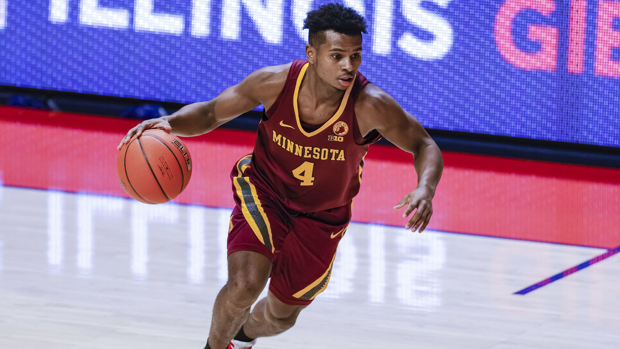 CHAMPAIGN, IL - DECEMBER 15: Jamal Mashburn Jr. #4 of the Minnesota Golden Gophers brings the ball up court during the game against the Illinois Fighting Illini at State Farm Center on December 15, 2020 in Champaign, Illinois.