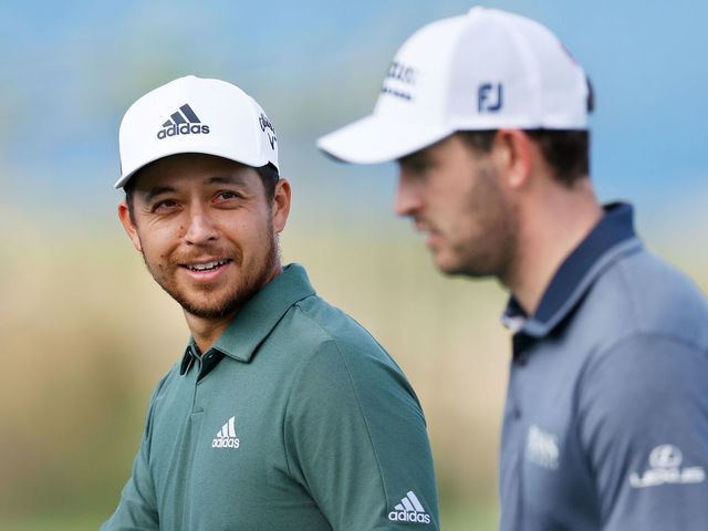KAPALUA, HAWAII - JANUARY 04: Xander Schauffele of the United States and Patrick Cantlay of the United States walk from the tenth green during a practice round prior to the Sentry Tournament Of Champions on the Plantation Course at Kapalua Golf Club on January 04, 2021 in Kapalua, Hawaii.