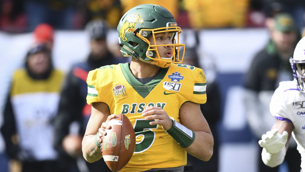 FRISCO, TX - JANUARY 11: Trey Lance #5 of the North Dakota State Bison looks to pass the ball against the James Madison Dukes during the Division I FCS Football Championship held at Toyota Stadium on January 11, 2020 in Frisco, Texas. North Dakota State defeated James Madison 28-20 to win the national title.
