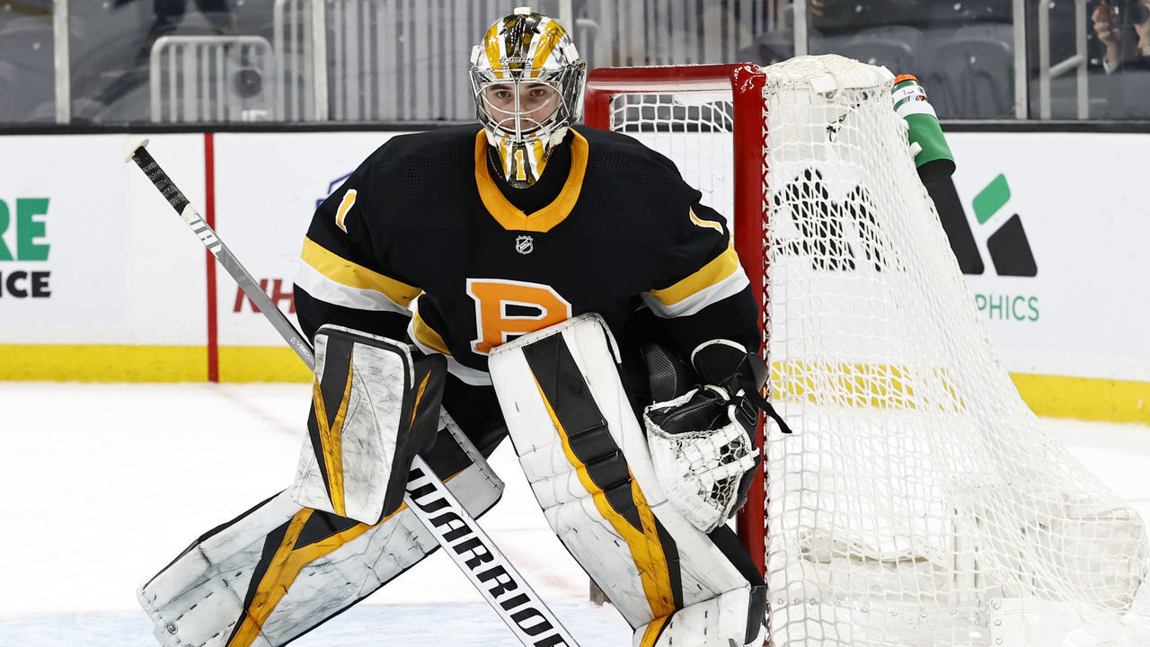 BOSTON, MA - APRIL 16: Boston Bruins goalie Jeremy Swayman (1) stares down a shot during a game between the Boston Bruins and the New York Islanders on April 16, 2021 at TD garden in Boston, Massachusetts.