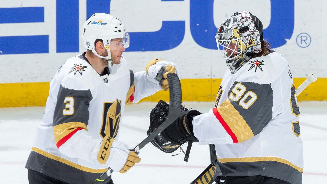 ANAHEIM, CA - APRIL 16: Brayden McNabb #3 of the Vegas Golden Knights celebrates with goaltender Robin Lehner #90 after a 4-0 win over the Anaheim Ducks in the game at Honda Center on April 16, 2021 in Anaheim, California.