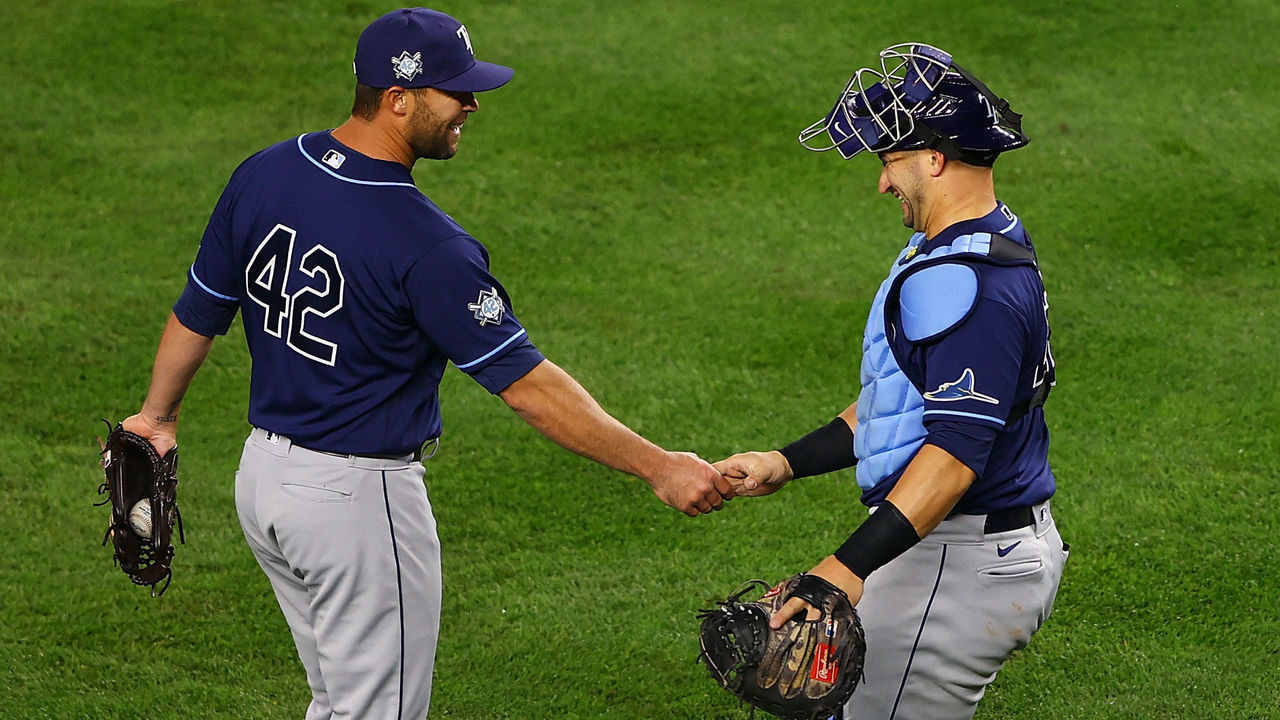 NEW YORK, NEW YORK - APRIL 16: Hunter Strickland #60 and Mike Zunino #10 of the Tampa Bay Rays after defeating the New York Yankees 8-2 at Yankee Stadium on April 16, 2021 in New York City.