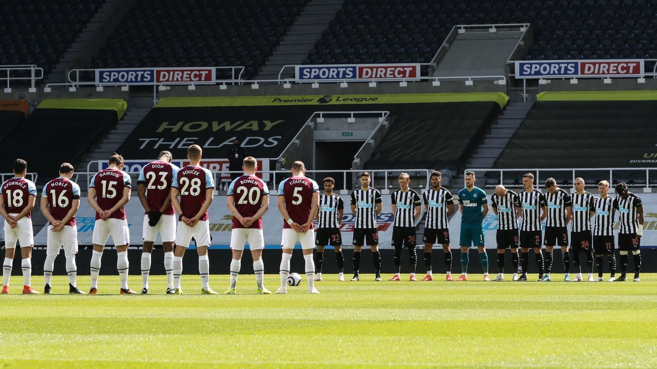 West Ham United's team players and Newcastle United's team players have a minute of silence as a tribute to late Prince Philip, Duke of Edinburgh during the English Premier League football match between Newcastle United and West Ham United at St James' Park in Newcastle-upon-Tyne, north east England on April 17, 2021. - RESTRICTED TO EDITORIAL USE. No use with unauthorized audio, video, data, fixture lists, club/league logos or 'live' services. Online in-match use limited to 120 images. An additional 40 images may be used in extra time. No video emulation. Social media in-match use limited to 120 images. An additional 40 images may be used in extra time. No use in betting publications, games or single club/league/player publications.