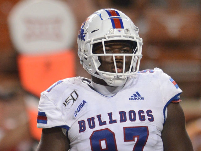 AUSTIN, TX - AUGUST 31: Louisiana Tech Bulldogs linemen Ka'Derrion Mason (96) and Milton Williams (97) get signals from the sideline during game against the Texas Longhorns on August 31, 2019, at Darrell K Royal-Texas Memorial Stadium in Austin, Texas.