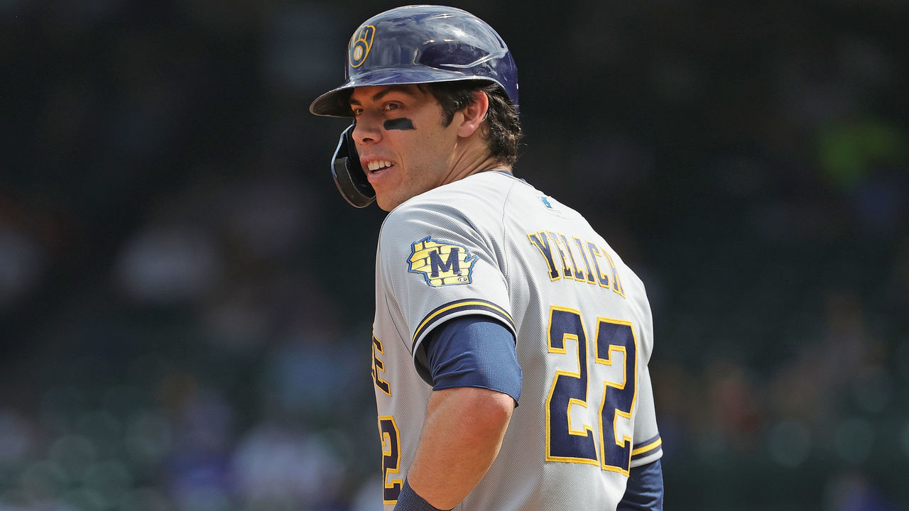 CHICAGO, ILLINOIS - APRIL 07: Christian Yelich #22 of the Milwaukee Brewers stands at third base against the Chicago Cubs at Wrigley Field on April 07, 2021 in Chicago, Illinois. The Brewers defeated the Cubs 4-2 in 10 innings.