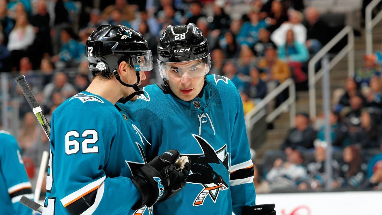 SAN JOSE, CA - FEBRUARY 13: Kevin Labanc #62 and Timo Meier #28 of the San Jose Sharks chat during a NHL game against the Arizona Coyotes at SAP Center on February 13, 2018 in San Jose, California.