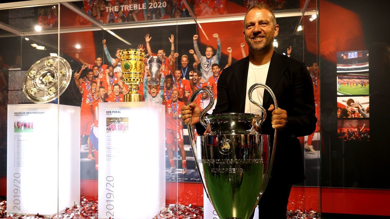 MUNICH, GERMANY - SEPTEMBER 09: Hans-Dieter Flick, head coach of Bayern Muenchen, hands over the UEFA Champions League trophy to the FC Bayern Museum on September 09, 2020 in Munich, Germany.