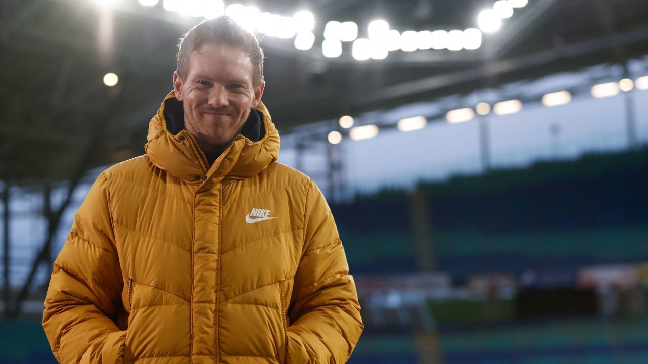 Leipzig's German headcoach Julian Nagelsmann arrives prior to the German first divison Bundesliga football match between RB Leipzig and TSG 1899 Hoffenheim in Leipzig, eastern Germany, on April 16, 2021. - DFL REGULATIONS PROHIBIT ANY USE OF PHOTOGRAPHS AS IMAGE SEQUENCES AND/OR QUASI-VIDEO