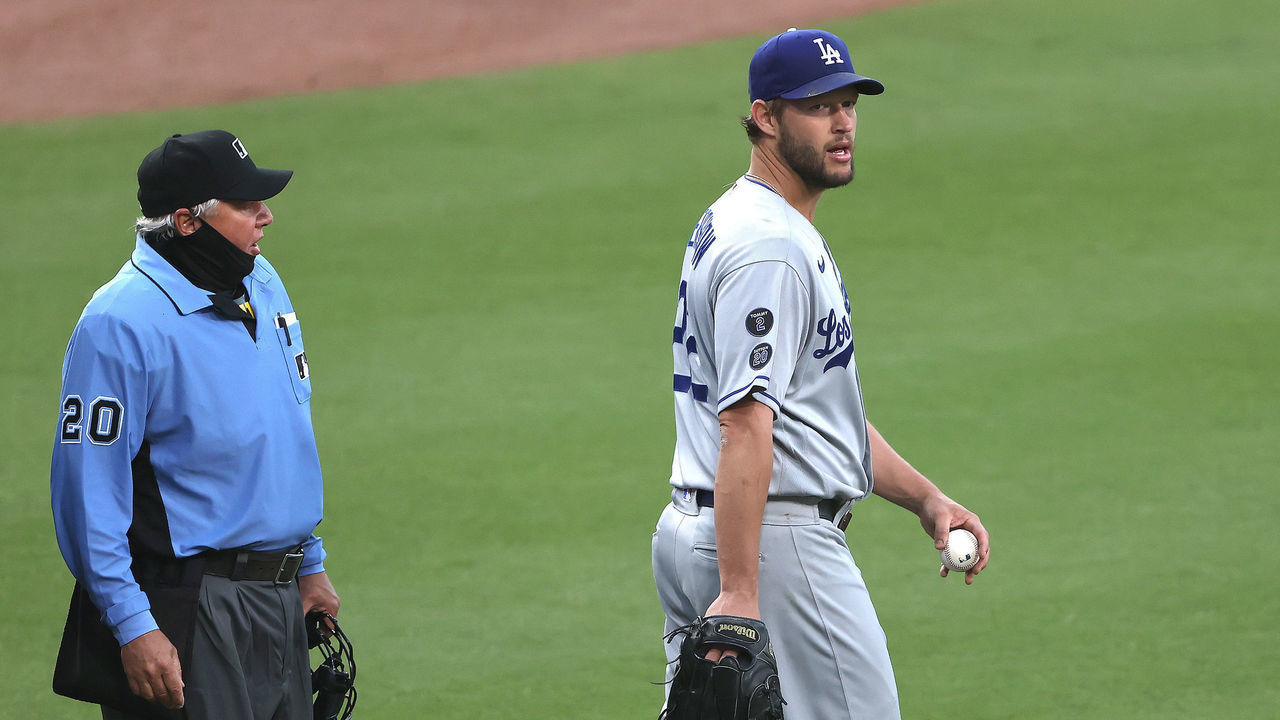 SAN DIEGO, CALIFORNIA - APRIL 17: Clayton Kershaw #22 of the Los Angeles Dodgers looks on after returning to the field after a catchers interference call during the fourth inning of a game against the San Diego Padres at PETCO Park on April 17, 2021 in San Diego, California.