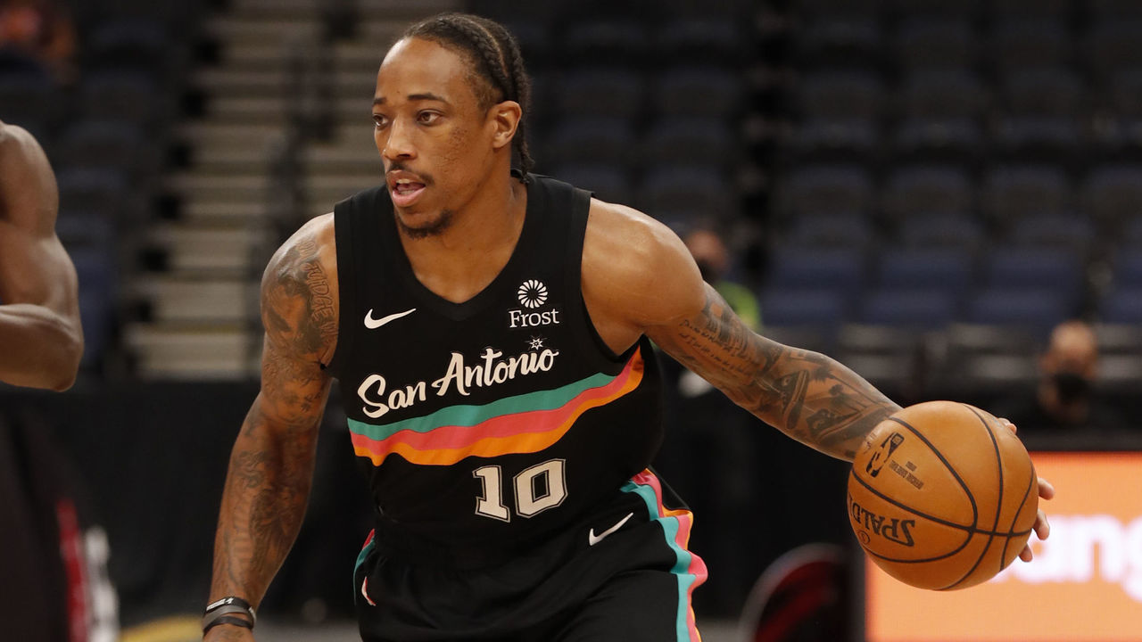 TAMPA, FL- APRIL 14: DeMar DeRozan #10 of the San Antonio Spurs dribbles the ball during the game against the Toronto Raptors on April 14, 2021 at Amalie Arena in Tampa, Florida. Mandatory Copyright Notice: Copyright 2021 NBAE