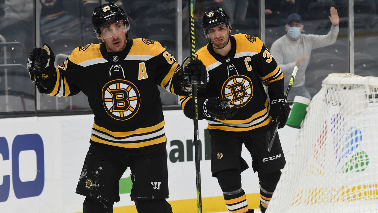 BOSTON, MA - APRIL 18: Brad Marchand #63 of the Boston Bruins scores a goal in the second period against the Washington Capitals at the TD Garden on April 18, 2021 in Boston, Massachusetts.