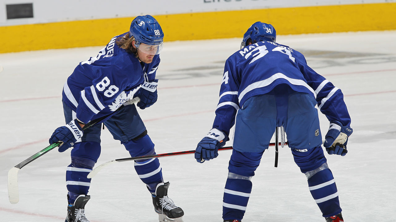 TORONTO, ON - FEBRUARY 17: William Nylander #88 and Auston Matthews #34 of the Toronto Maple Leafs chat prior to a faceoff against the Ottawa Senators during an NHL game at Scotiabank Arena on February 17, 2021 in Toronto, Ontario, Canada. The Maple Leafs defeated the Senators 2-1.