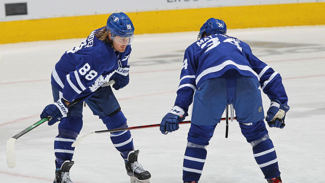 TORONTO, ON - FEBRUARY 17: William Nylander #88 and Auston Matthews #34 of the Toronto Maple Leafs chat prior to a faceoff against the Ottawa Senators during an NHL game at Scotiabank Arena on February 17, 2021 in Toronto, Ontario, Canada. The Maple Leafs defeated the Senators 2-1.