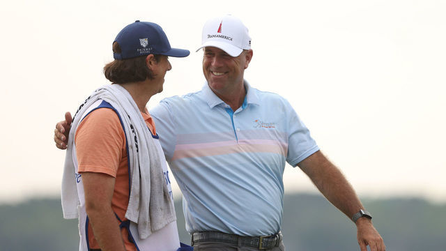 HILTON HEAD ISLAND, SOUTH CAROLINA - APRIL 18: Stewart Cink of the United States celebrate with his caddie and son, Reagan Cink, on the 18th green after winning the RBC Heritage on April 18, 2021 at Harbour Town Golf Links in Hilton Head Island, South Carolina.