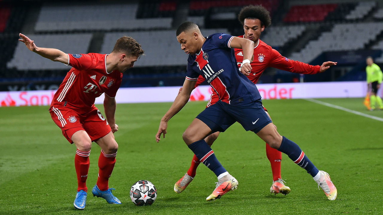 PARIS, FRANCE - APRIL 13: Kylian Mbappe of Paris Saint-Germain, Joshua Kimmich and Leroy Sane of FC Bayern Munich battle for possession during the UEFA Champions League Quarter Final Second Leg match between Paris Saint-Germain and FC Bayern Munich at Parc des Princes on April 13, 2021 in Paris, France.