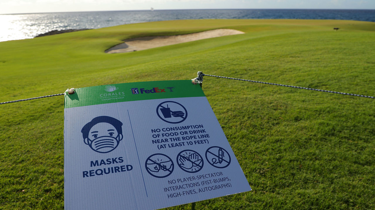 PUNTA CANA, DOMINICAN REPUBLIC - MARCH 25: Covid-19 protocol signage near the eighth green during the first round of the Corales Puntacana Resort & Club Championship on March 25, 2021 in Punta Cana, .