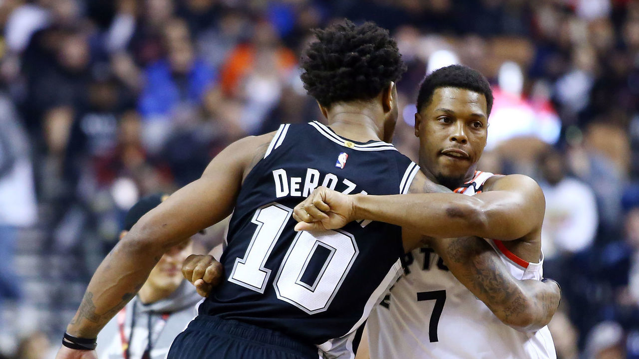 TORONTO, ON - JANUARY 12: DeMar DeRozan #10 of the San Antonio Spurs hugs Kyle Lowry #7 of the Toronto Raptors prior to the first half of an NBA game at Scotiabank Arena on January 12, 2020 in Toronto, Canada.