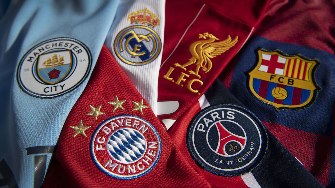 MANCHESTER, ENGLAND - OCTOBER 20: The badges of Manchester City, Bayern Munich, Real Madrid, Liverpool, Paris St-Germain and FC Barcelona, the top teams in the Champions League on October 20, 2020 in Manchester, United Kingdom.