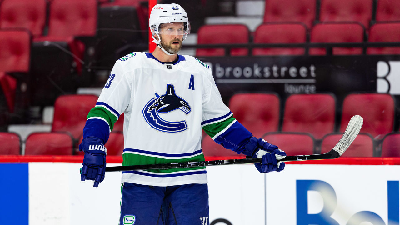 OTTAWA, ON - MARCH 17: Vancouver Canucks Defenceman Alexander Edler (23) waits for a face-off during first period National Hockey League action between the Vancouver Canucks and Ottawa Senators on March 17, 2021, at Canadian Tire Centre in Ottawa, ON, Canada.
