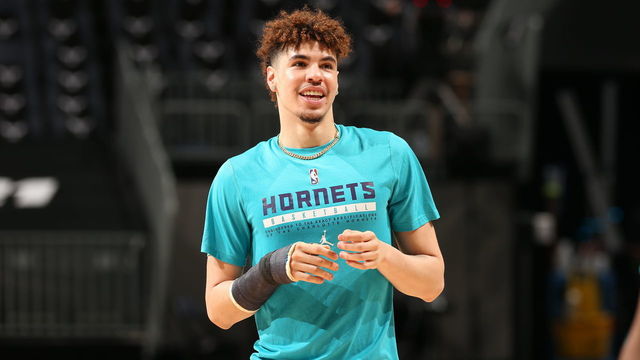 CHARLOTTE, NC - APRIL 11: LaMelo Ball #2 of the Charlotte Hornets smiles before the game against the Atlanta Hawks on April 11, 2021 at Spectrum Center in Charlotte, North Carolina. Mandatory Copyright Notice: Copyright 2021 NBAE