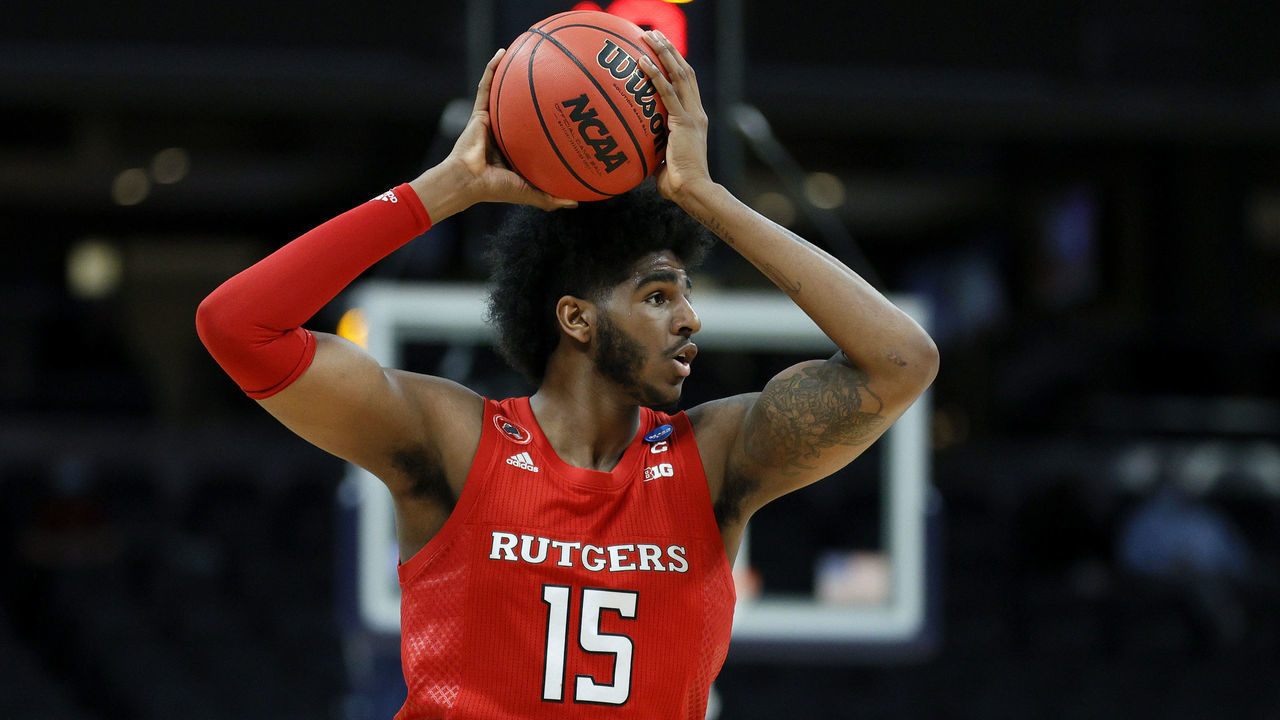 INDIANAPOLIS, INDIANA - MARCH 19: Myles Johnson #15 of the Rutgers Scarlet Knights controls the ball in the second half against the Clemson Tigers in the first round game of the 2021 NCAA Men's Basketball Tournament at Bankers Life Fieldhouse on March 19, 2021 in Indianapolis, Indiana.