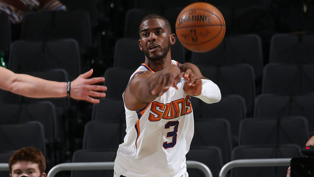 MILWAUKEE, WI - APRIL 19: Chris Paul #3 of the Phoenix Suns passes the ball against the Milwaukee Bucks on April 19, 2021 at the Fiserv Forum Center in Milwaukee, Wisconsin. Mandatory Copyright Notice: Copyright 2021 NBAE .