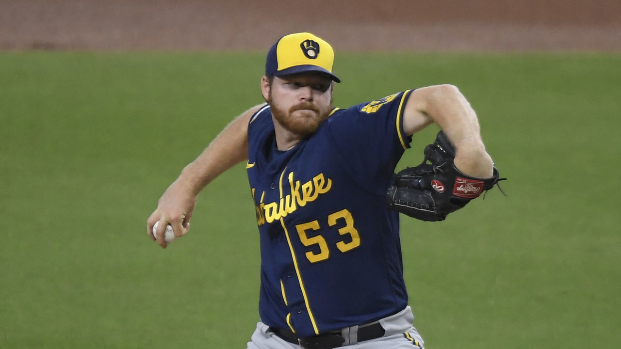 SAN DIEGO, CA - APRIL 19: Brandon Woodruff #53 of the Milwaukee Brewers delivers a pitch during the first inning of a game against the San Diego Padres at Petco Park on April 19, 2021 in San Diego, California.
