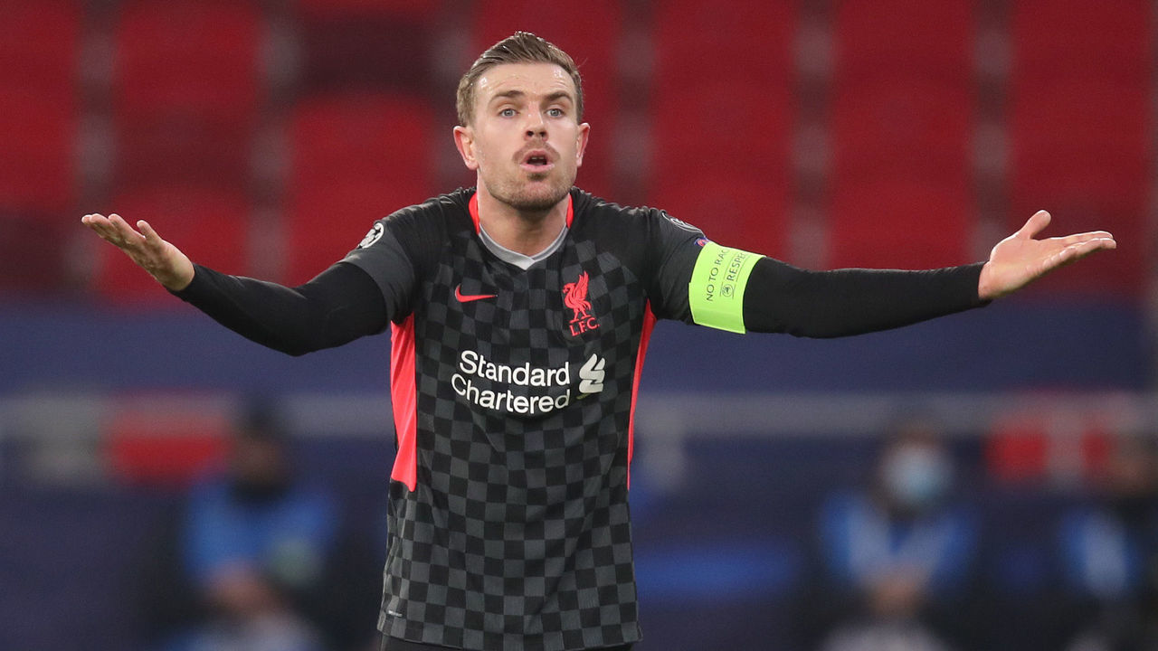BUDAPEST, HUNGARY - FEBRUARY 16: Jordan Henderson of FC Liverpool reacts during the UEFA Champions League Round of 16 match between RB Leipzig and Liverpool FC at Puskas Arena on February 16, 2021 in Budapest, Hungary.