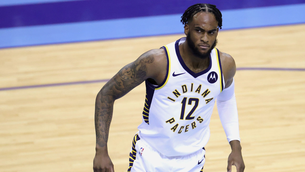 HOUSTON, TEXAS - APRIL 14: Oshae Brissett #12 of the Indiana Pacers reacts during the second quarter against the Houston Rockets at Toyota Center on April 14, 2021 in Houston, Texas.