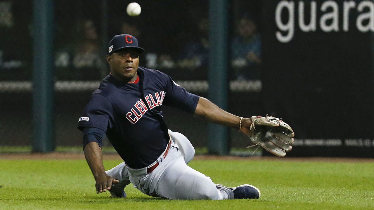 CHICAGO, ILLINOIS - SEPTEMBER 26: Yasiel Puig #66 of the Cleveland Indians is unable to catch the RBI triple by Jose Abreu #79 of the Chicago White Sox during the fifth inning of a game at Guaranteed Rate Field on September 26, 2019 in Chicago, Illinois.