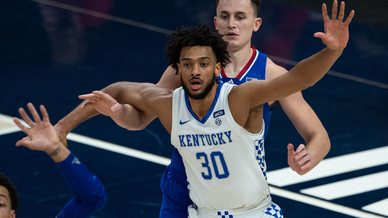 INDIANAPOLIS, IN - DECEMBER 01: Kentucky Wildcats forward Olivier Sarr (30) post up against Kansas Jayhawks forward Mitch Lightfoot (44) during the men's Champions Classic college basketball game between the Kansas Jayhawks and Kentucky Wildcats on December 1, 2020, at Bankers Life Fieldhouse in Indianapolis, IN.