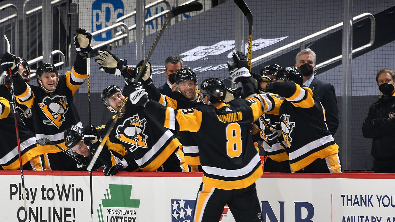 PITTSBURGH, PA - APRIL 20: Brian Dumoulin #8 of the Pittsburgh Penguins celebrates his first period goal against the New Jersey Devils at PPG PAINTS Arena on April 20, 2021 in Pittsburgh, Pennsylvania.