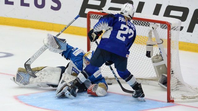 Annie Pankowski of the United States (R) scores a shootout goal past goalkeeper Noora Räty of Finland during the IIHF Women's Ice Hockey World Championships final match between the United States and Finland in Espoo, Finland, on April 14, 2019.