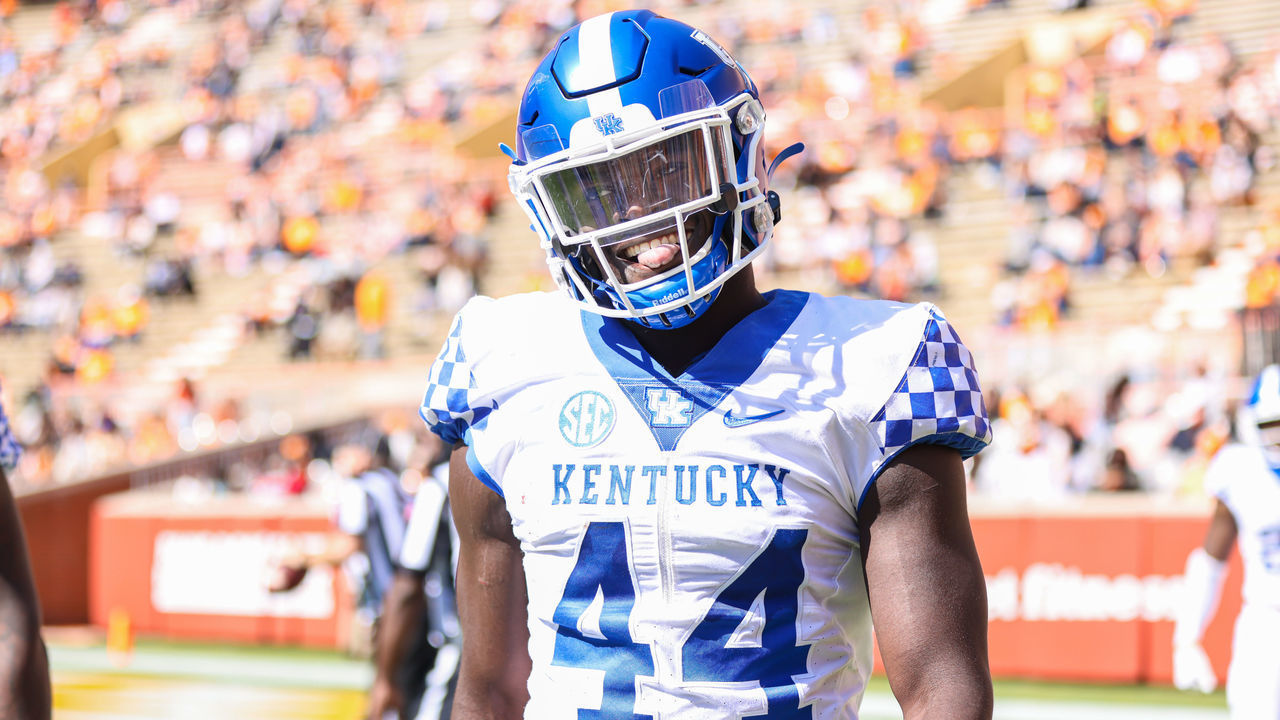 KNOXVILLE, TN - OCTOBER 17: Jamin Davis #44 of the Kentucky Wildcats celebrates returning an interception for a touchdown against the Tennessee Volunteers at Neyland Stadium on October 17, 2020 in Knoxville, Tennessee.