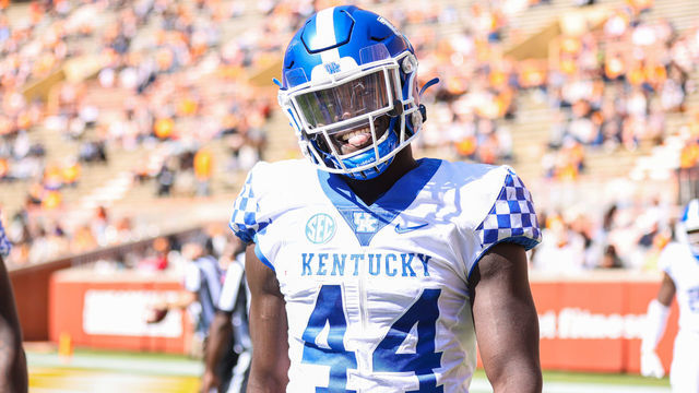KNOXVILLE, TN - OCTOBER 17: Jamin Davis #44 of the Kentucky Wildcats celebrates returning an interception for a touchdown against the Tennessee Volunteers at Neyland Stadium on October 17, 2020 in Knoxville, Tennessee.