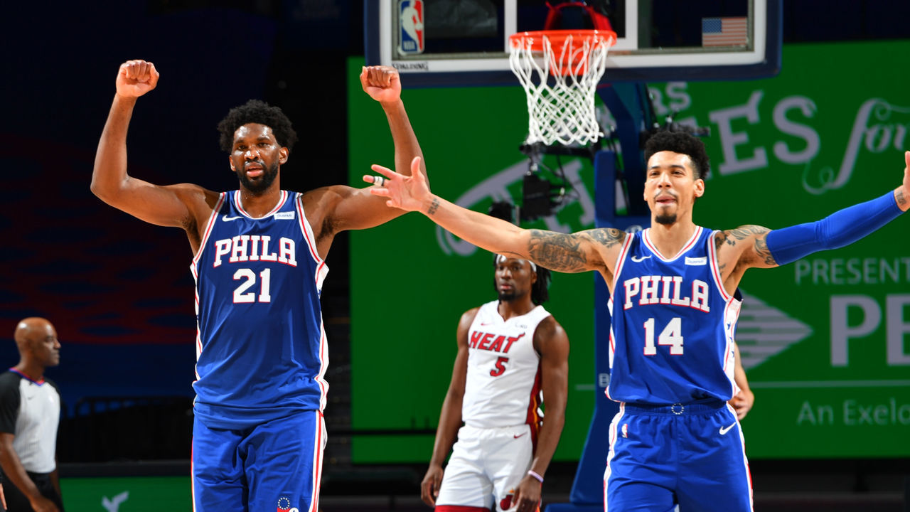 PHILADELPHIA, PA - JANUARY 12: Joel Embiid #21 and Danny Green #14 of the Philadelphia 76ers celebrate during the game against the Miami Heat on January 12, 2021 at the Wells Fargo Center in Philadelphia, Pennsylvania NOTE TO USER: User expressly acknowledges and agrees that, by downloading and/or using this Photograph, user is consenting to the terms and conditions of the Getty Images License Agreement. Mandatory Copyright Notice: Copyright 2021 NBAE