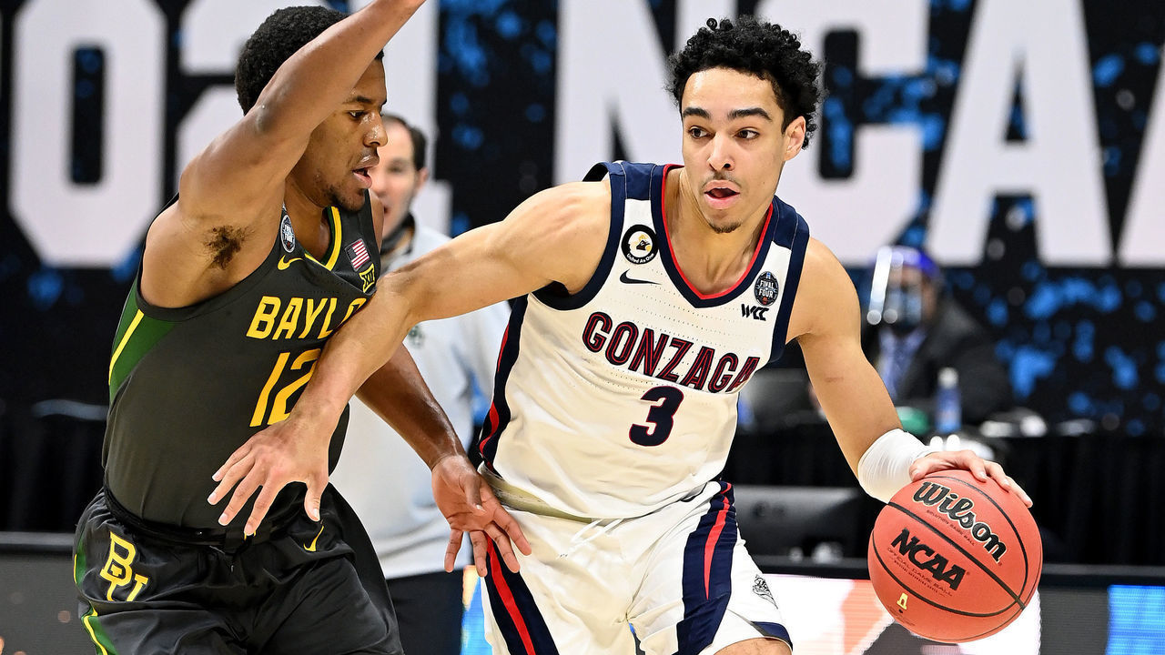 INDIANAPOLIS, INDIANA - APRIL 05: Andrew Nembhard #3 of the Gonzaga Bulldogs moves the ball against Jared Butler #12 of the Baylor Bears in the National Championship game of the 2021 NCAA Men's Basketball Tournament at Lucas Oil Stadium on April 05, 2021 in Indianapolis, Indiana.